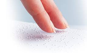 fingers on Braille document